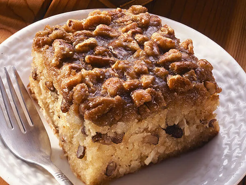 Coconut Pecan Cake with Broiled Brown Sugar Frosting